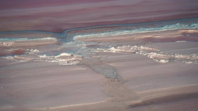 Salt close up in Mexico . Camera goes straight forward, close to the ground. . High quality FullHD footage