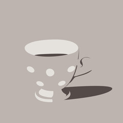 gray cup with white circles