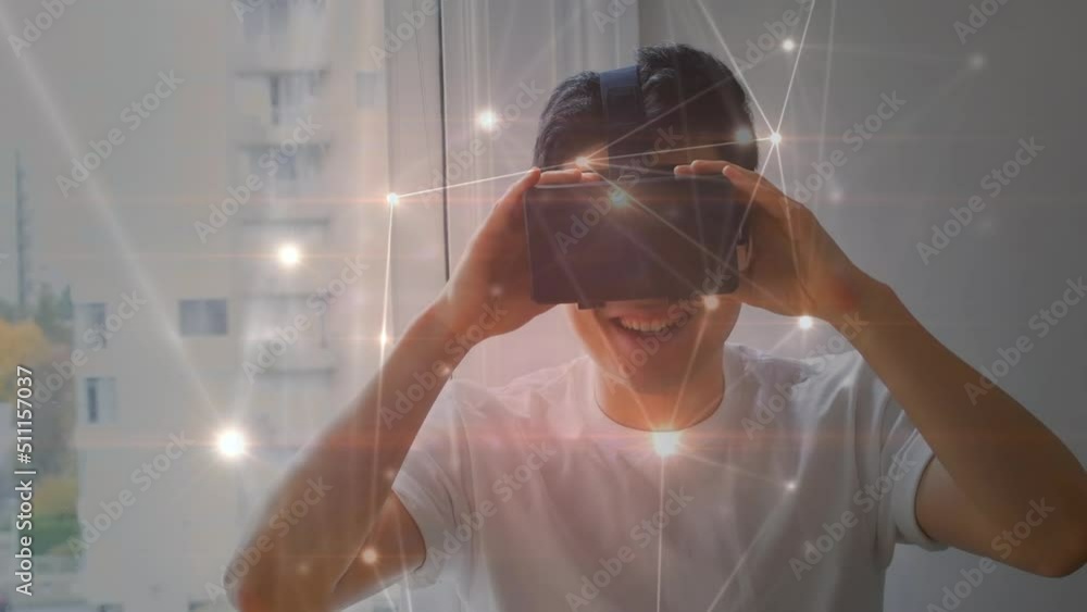 Poster animation of network of connections over biracial man using vr headset