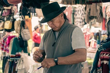 Ecuadorian indigenous family merchant of the oldest Inca culture in South America