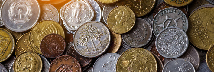 Background of Euro coins money.Numismatics.United kingdom Pound coin.US coins.Coins of different countries of the world. Iron money.Collection