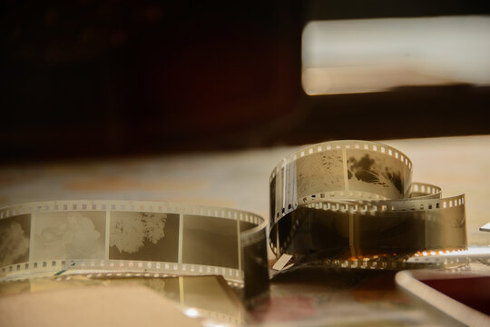 close up of a film in the afternoon golden hour on a table