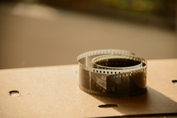 close up of a film in the afternoon golden hour on a table