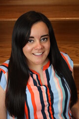 beautiful portrait of a woman on wooden stairs
