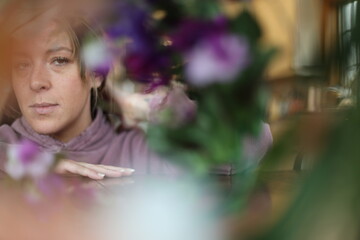 floral portrait of a cheerful woman