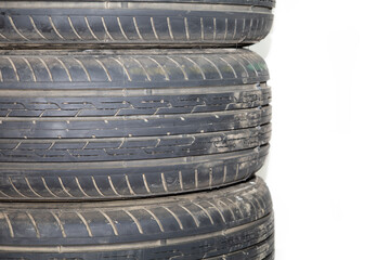 Summer tires on a passenger car on a white background