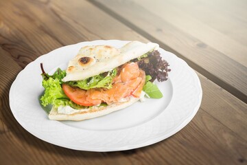 Pressed and toasted sandwich with tomato, mozzarella and basil. Delicious breakfast or snack, Clean eating, dieting, vegan food concept.