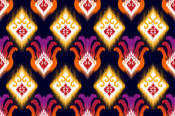 Fototapeta na wymiar Ikat abstract geometric ethnic seamless pattern design. Tribal boho native textile turkey traditional embroidery vector. Aztec fabric carpet mandala ornaments textile decorations wallpaper.