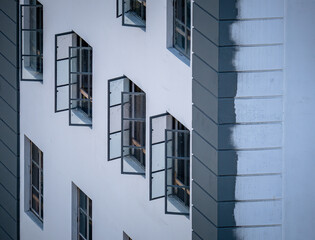 Open Windows in White Building