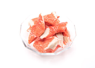Imitation crab in glass bowl isolated on white background. Japanese food