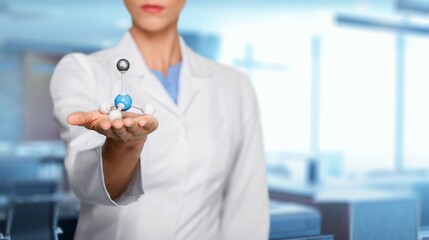 Scientist with a model of mockup made of molecules. Properties of substances depend on structure and composition of molecules concept