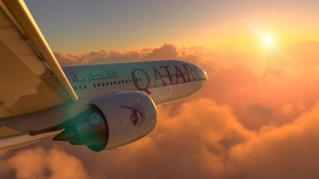 Boeing 777 Qatar Airways flying on amazing sunset, 15 jun, 2022, Sao Paulo, Brazil.