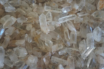 Raw crystal white quartz gemstone rocks. It has a hardness of 7 on the Mohs scale of mineral...