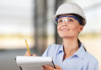 Happy smiling woman. Professional engineers and inspectors investigating the neatness of houses