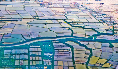 Healthy river flow seen from above.

Healthy rivers are used for various activities in ponds, rice fields, transportation and fisheries
