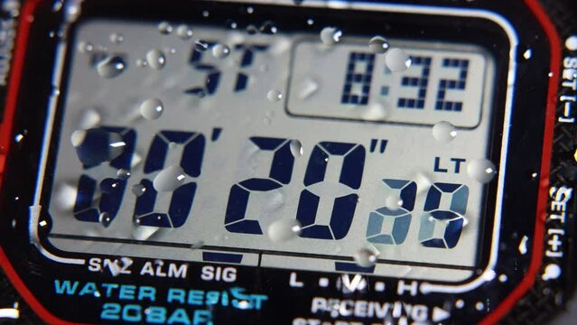 LCD display of a tough sports watch with running timer and stopwatch 
