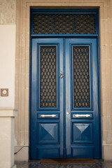 Beautiful old doors in dark blue in ancient building in Cyprus