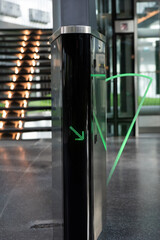 Automatic glass gate with an id card checking system in a modern public space such as airport,...