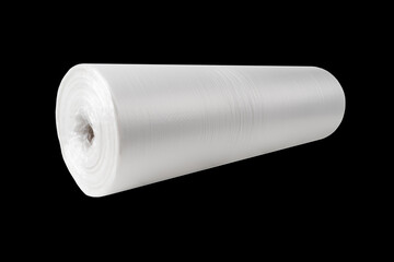 Roll of transparent packaging plastic bags isolated on black background with clipping path.