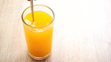 Man is mixing  electrolyte Powder in  the glass, in studio   Chiangmai  Thailand