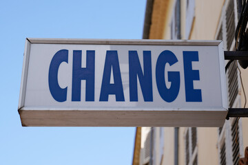 change means in french text exchange money office on wall agency