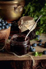 Blueberry jam with fresh berries.
