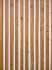 Seamless texture of decorative wooden sticks placed vertically,with white background.