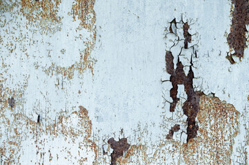 Rusty surface with old paint residue. Rusty metal surface as background image.