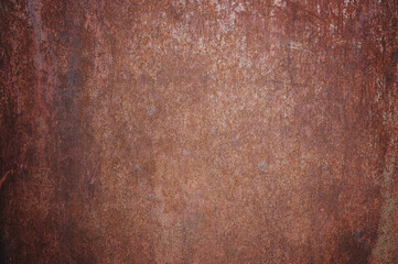 Rusty surface with old paint residue. Rusty metal surface as background image.
