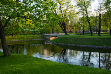 Fototapeta na wymiar Summer canal pond landscape in Saint Petersburg, Russia.