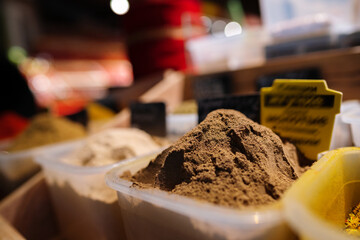 Colorful spices at a market for sale, close up