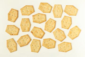 Cracker cookies on a light background. Salted crackers with onions.