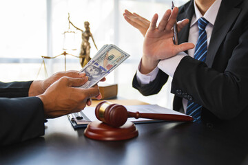 lawyer or judge is refusing bribes. In the client's courtroom at the lawyer's office In order to...
