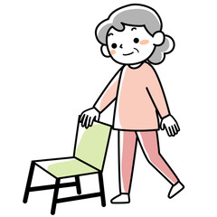 片足上げ運動をするシニア女性