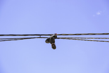 Slippers on electrical wires