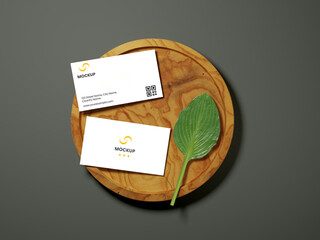 Double-Side Of Visiting Card Mockup With Leaf Over Round Wooden Part.