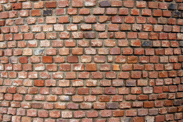 Naturel looking red brick wall close up , background of old vintage brick wall
