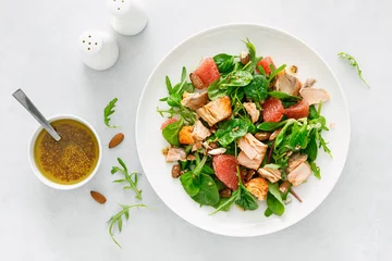 Fotobehang Grilled salmon salad with grapefruit, almonds and salad mix. Top view © Sea Wave