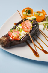 Greek-inspired stuffed eggplant, filled with veggies and flavors of the Mediterranean