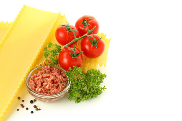 Ingredients for cooking lasagna isolated on white background