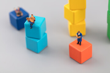 Obraz premium Readers at different levels in the miniature world