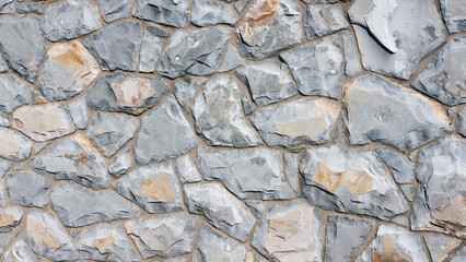 Muro de placas de piedras gris plateadas