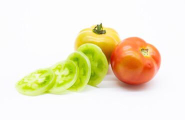 Whole and slices Tomatoes isolated on white background. organic vegetable .