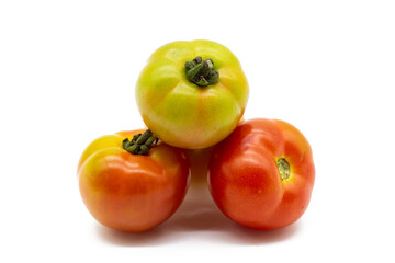 organic tomatoes isolated on white background.