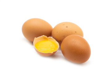 whole eggs and broken isolated on a white background
