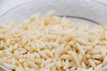 Churmure or murmure or moori, Puffed rice, food ingredient. Traditional food isolated on background
