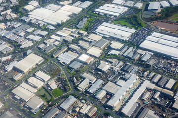 Rooftop patterns of industrial and bordering residential area in South Auckland.