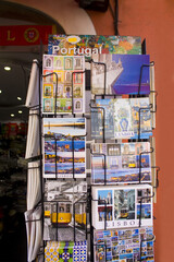 Stand with postcards depicting the attractions of Portugal