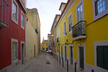 Fototapeta na wymiar Old buildings of the district Belem at evening in Lisbon