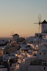 Fototapeta premium View of Oia, the most stunning village of Santorini and an amazing sunset